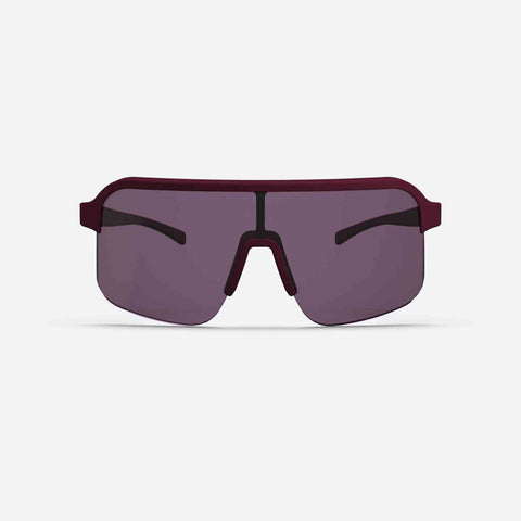 Ileve N°4 Lite Fahrradbrille mit violetten Gläsern und Bordeaux-Rahmen, vereint Funktionalität und modernes Design für Radfahrer.