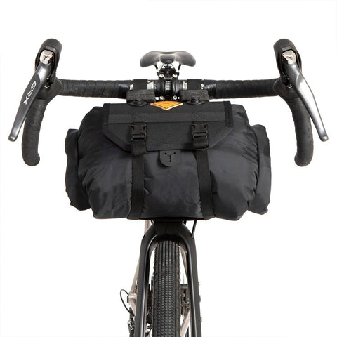 a close up of a bike with a bag on the back