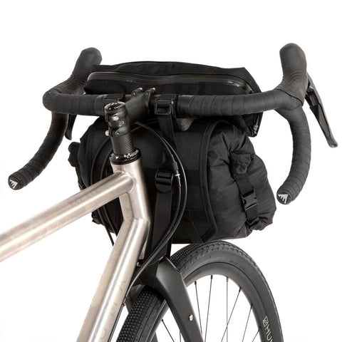 a close up of a bicycle with a back pack