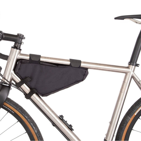 a bicycle with a seat bag attached to it