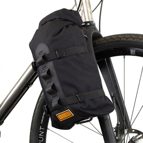 a close up of a bag on the back of a bike